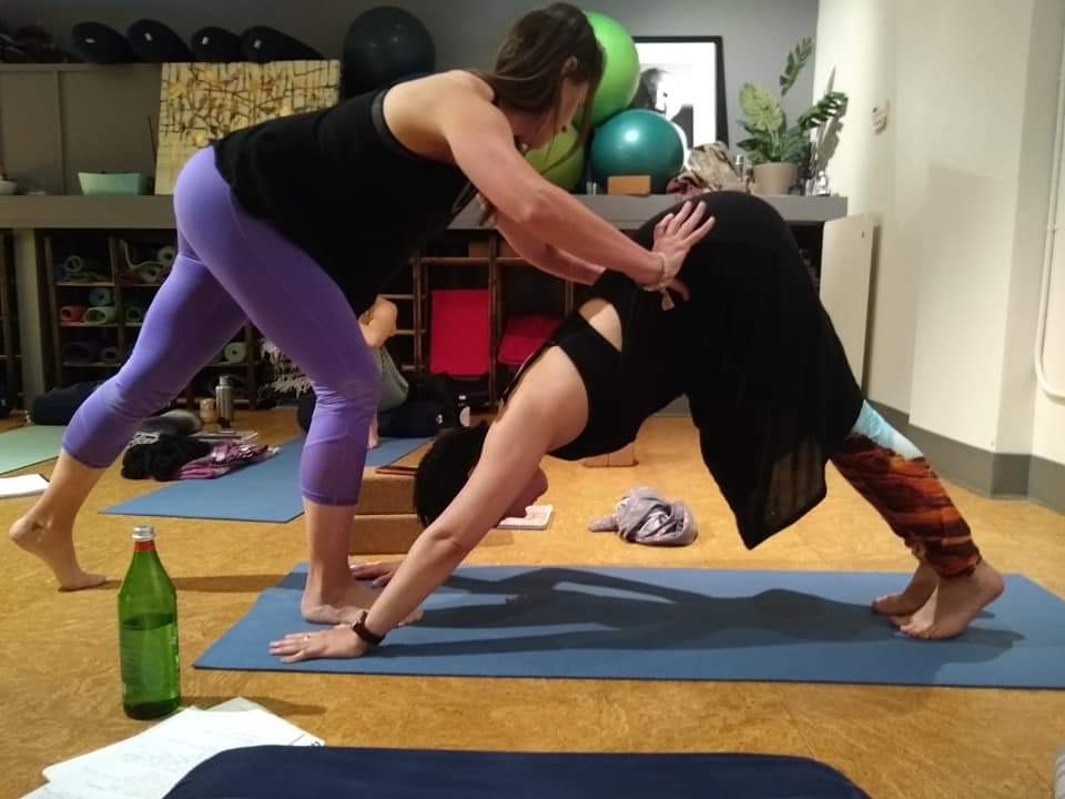 Women doing prenatal yoga